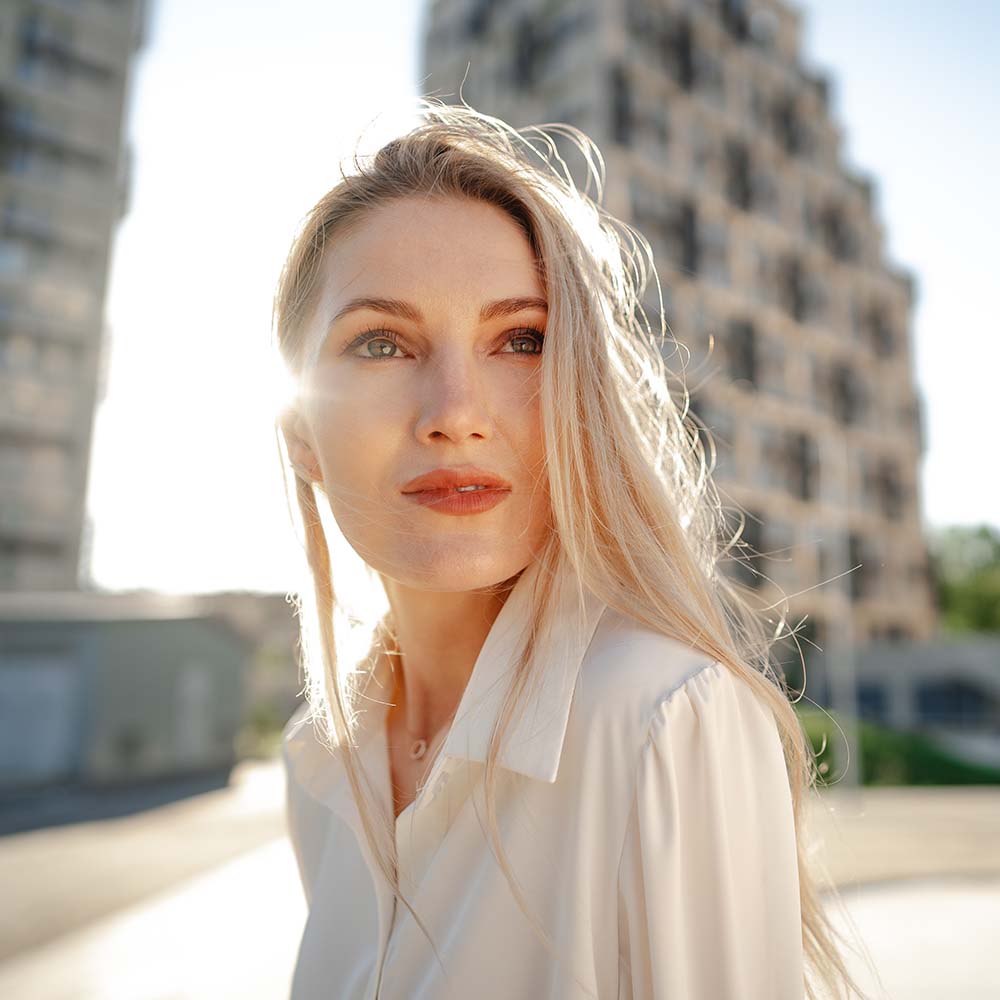 Home 1 close up portrait of young businesswoman outdoors 5PRP7CF 1 First Class Taxi